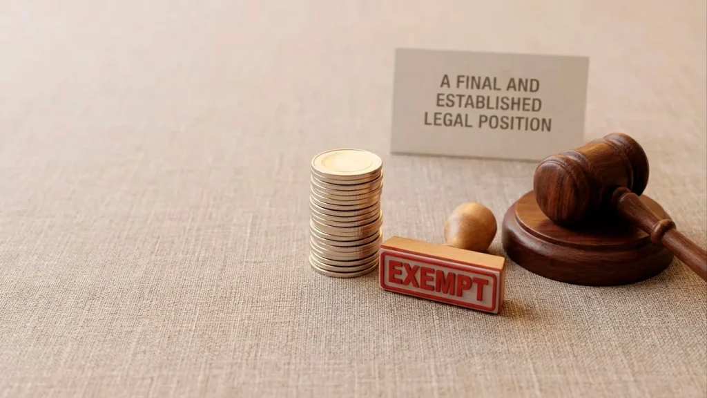 A coin stack beside a tax-exempt stamp and a gavel, representing the legal principle that UK gambling winnings are not taxed as income or capital gains.